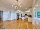 Modern kitchen with stainless steel appliances, white cabinetry, and a central island at 6765 Crofton Dr, Alpharetta, GA 30005