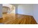 Bright living room showing the hardwood floors and a staircase at 6765 Crofton Dr, Alpharetta, GA 30005