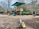 Community playground featuring slides, climbing structures, and a rocking horse, set in a kid-friendly environment at 6765 Crofton Dr, Alpharetta, GA 30005