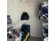 This walk-in closet features shelving and ample storage space at 75 Orchard Dr, Covington, GA 30014