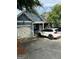 View of the garage with a car parked on the driveway at 75 Orchard Dr, Covington, GA 30014