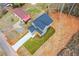 An aerial view shows the placement of the modern home in its lot with a long driveway and small front yard at 192 Pecan Dr, Canton, GA 30114