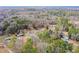 Aerial view shows the home situated among neighborhood homes surrounded by trees, highlighting the community's landscape at 192 Pecan Dr, Canton, GA 30114