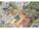 An aerial shot showcasing a home's location within its neighborhood and its proximity to nearby homes and local roads at 192 Pecan Dr, Canton, GA 30114