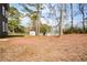 View of the large backyard, with ample space to create a garden, build a pool, or simply enjoy the outdoors at 192 Pecan Dr, Canton, GA 30114