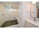 Bathroom featuring a tiled shower, a soaking tub and a single sink vanity at 192 Pecan Dr, Canton, GA 30114