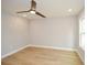 Bright bedroom features a ceiling fan, recessed lights and views from the window at 192 Pecan Dr, Canton, GA 30114