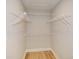 Well-organized walk-in closet with wire shelving, ready for storage and easy organization at 192 Pecan Dr, Canton, GA 30114