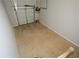 View of the garage showing the door and floor of this useful space at 192 Pecan Dr, Canton, GA 30114