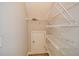 Well-organized pantry with wire shelving and access door, maximizing storage space at 192 Pecan Dr, Canton, GA 30114