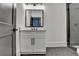 Elegant bathroom features a single vanity and glass-enclosed shower at 2255 Buford Dam Rd, Buford, GA 30518
