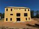 Rear view of the house during framing stage at 2255 Buford Dam Rd, Buford, GA 30518