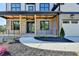 Charming front porch with stone pillars and a modern railing system, offering a welcoming entryway at 2255 Buford Dam Rd, Buford, GA 30518