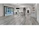Spacious kitchen with an island, modern appliances, and sliding glass doors to the backyard at 2255 Buford Dam Rd, Buford, GA 30518