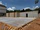 Basement foundation poured with membrane on gravel base and perimeter drains at 2257 Buford Dam Rd, Buford, GA 30518
