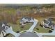 Expansive aerial view of two story home and yard with adjacent homes in a cul-de-sac at 76 Telfair Ct, Acworth, GA 30101