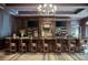 Sophisticated bar with leather chairs, liquor display, and modern lighting at 76 Telfair Ct, Acworth, GA 30101