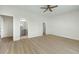 Spacious bedroom with light hardwood floors and bathroom view at 76 Telfair Ct, Acworth, GA 30101