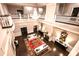 Grand foyer with a soaring ceiling, chandelier, fireplace, and elegant furnishings at 76 Telfair Ct, Acworth, GA 30101