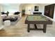 Recreation room featuring a pool table, foosball table, and comfortable seating area at 76 Telfair Ct, Acworth, GA 30101