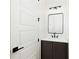 Modern half bath featuring a sleek vanity with black accents and stylish lighting at 76 Telfair Ct, Acworth, GA 30101