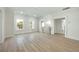Bright hallway with hardwood floors, and views into multiple rooms at 76 Telfair Ct, Acworth, GA 30101