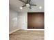 Neutral-toned bedroom boasting recessed lighting, ceiling fan and modern brown accent wall at 1089 White Oak Sw Ave, Atlanta, GA 30310
