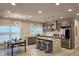 Modern kitchen featuring stainless steel appliances, granite countertops, and stylish lighting, perfect for cooking at 1089 White Oak Sw Ave, Atlanta, GA 30310