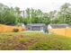 Large backyard with grassy area and wooden fence at 1699 Olympian Sw Way, Atlanta, GA 30310