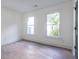 Spacious bedroom with hardwood floors and large windows at 1699 Olympian Sw Way, Atlanta, GA 30310