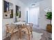 Small dining area with round table and four chairs at 1699 Olympian Sw Way, Atlanta, GA 30310