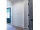Clean hallway with hardwood floors and modern doors at 1699 Olympian Sw Way, Atlanta, GA 30310