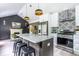 Modern kitchen with island, stainless steel appliances, and white cabinets at 1699 Olympian Sw Way, Atlanta, GA 30310