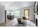 Open concept kitchen with island and stainless steel appliances at 1699 Olympian Sw Way, Atlanta, GA 30310
