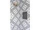 Elegant shower with patterned tile and brass fixtures at 1699 Olympian Sw Way, Atlanta, GA 30310