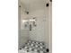 Walk-in shower with glass door and updated fixtures at 3182 Lake Ave, Atlanta, GA 30354
