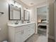 Bathroom featuring double vanity with white cabinets and modern fixtures at 3182 Lake Ave, Atlanta, GA 30354