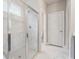 Modern bathroom with marble tile shower and glass door at 376 Lakeside Ct, Canton, GA 30114