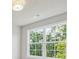 Bedroom with a view through a window, and white trim at 376 Lakeside Ct, Canton, GA 30114