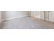 Bright bedroom boasts neutral walls and carpeting, along with access to the bathroom at 376 Lakeside Ct, Canton, GA 30114