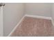 Staircase with neutral carpeting at 376 Lakeside Ct, Canton, GA 30114