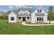 Beautiful two-story home with covered entrance and manicured lawn at 170 Ewing Way, Dacula, GA 30019