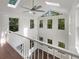 Foyer boasts soaring windows, skylights, and a modern ceiling fan at 819 Bermuda Run, Woodstock, GA 30189