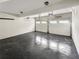 The garage features a concrete floor and two garage doors at 819 Bermuda Run, Woodstock, GA 30189