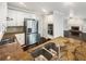 Modern kitchen with stainless steel appliances, granite countertops and eat-in area at 819 Bermuda Run, Woodstock, GA 30189
