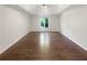 Spacious bedroom with hardwood floors and tray ceilings at 819 Bermuda Run, Woodstock, GA 30189
