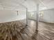Unfinished basement with exposed ceiling, support beams, and two windows at 125 Enterprise Dr, Temple, GA 30179