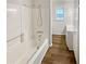 Clean bathroom featuring a toilet, shower and sink at 125 Enterprise Dr, Temple, GA 30179