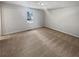 Neutral carpet in a spacious bedroom with a window at 125 Enterprise Dr, Temple, GA 30179