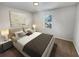 Bedroom featuring neutral decor, carpeted flooring, and a bright window at 125 Enterprise Dr, Temple, GA 30179